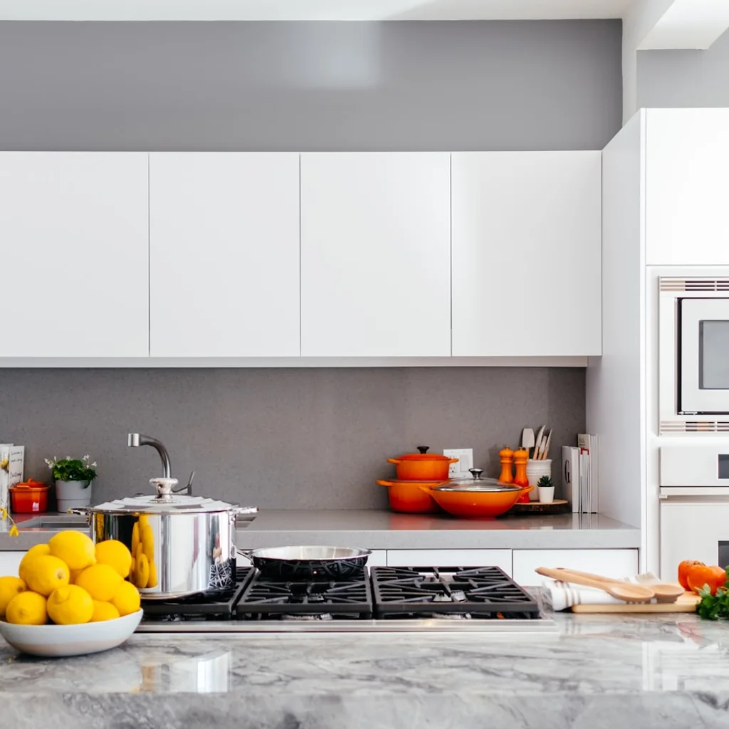 Clean kitchen pantry with clear containers and grouped food items