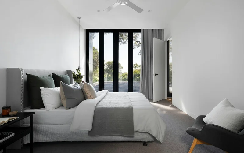 Bright airy small bathroom with clean lines and open floor space