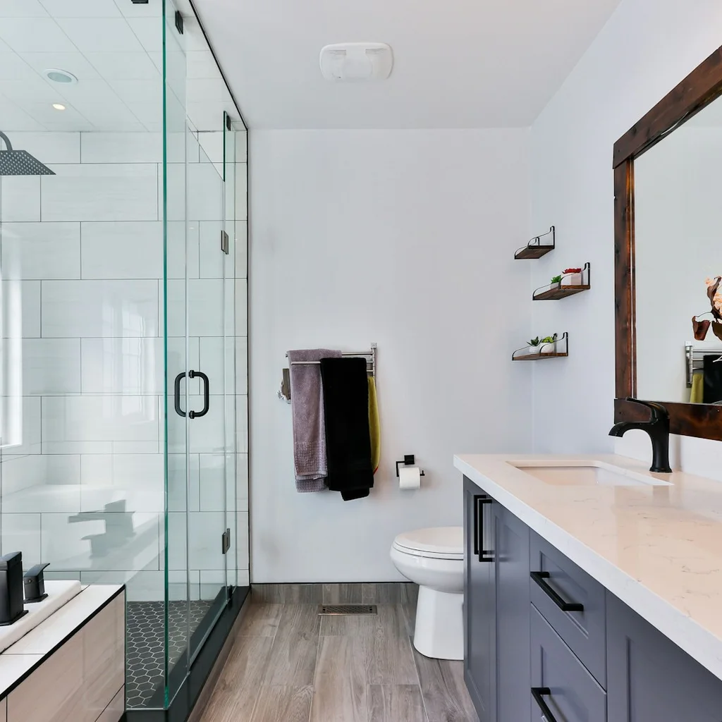 Clutter-free counter with a few essentials in a serene small bathroom