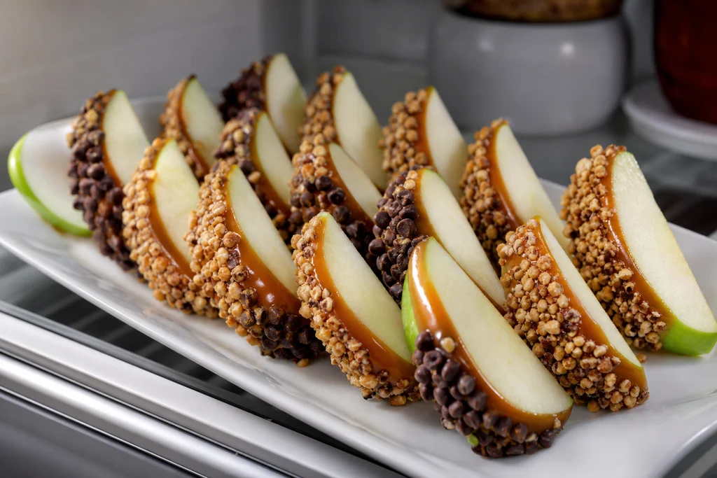 Chilled caramel apple slices on a platter ready to serve
