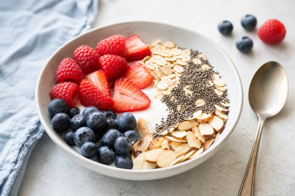 Finished Greek yogurt breakfast bowl with berries, oats and almonds