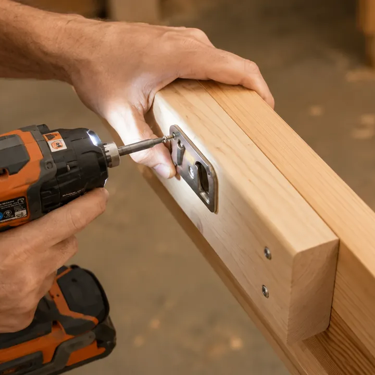 Installing bed rail connector hardware on a wooden rail
