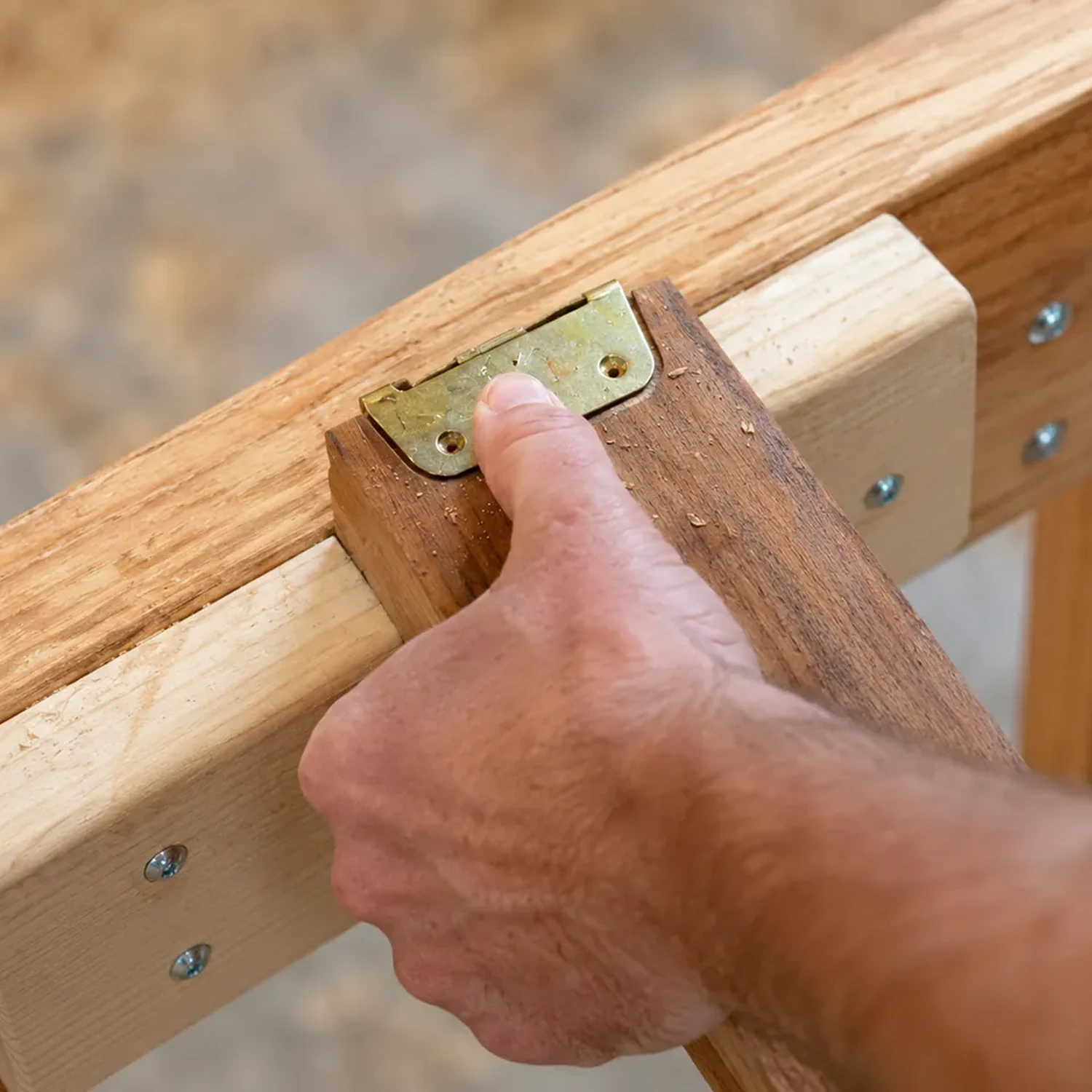 Fitting a center support rail bracket inside a platform bed frame
