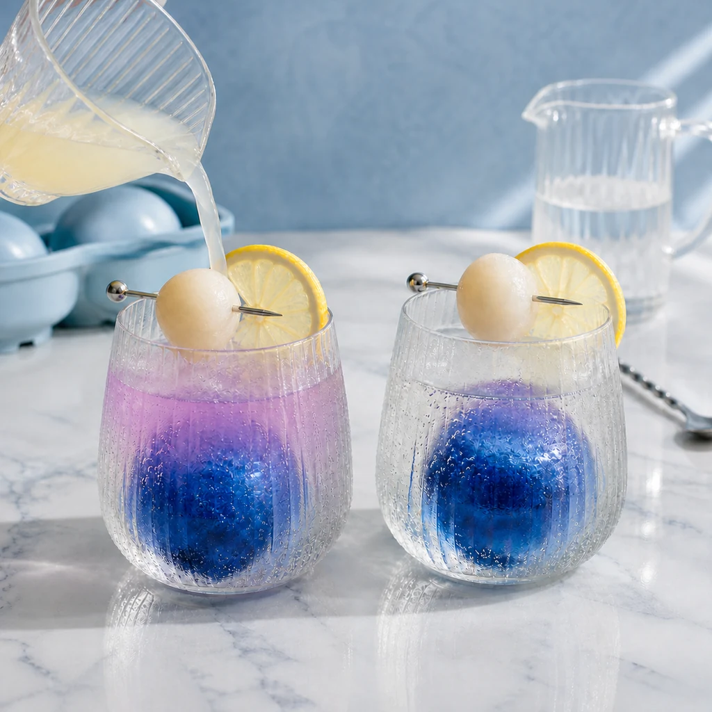 Lemon turns a blue lychee mocktail violet
