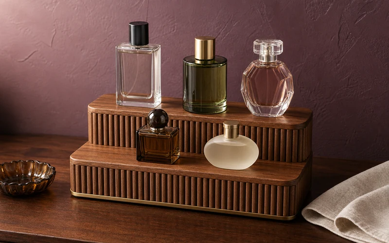 Finished DIY fluted perfume display stand on a vanity