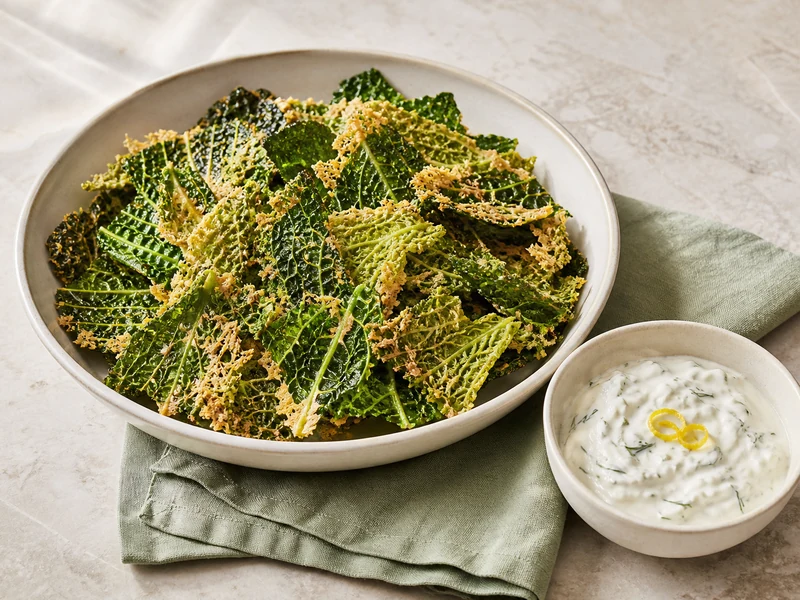 Crispy Parmesan Savoy cabbage chips with lemon dill yogurt dip