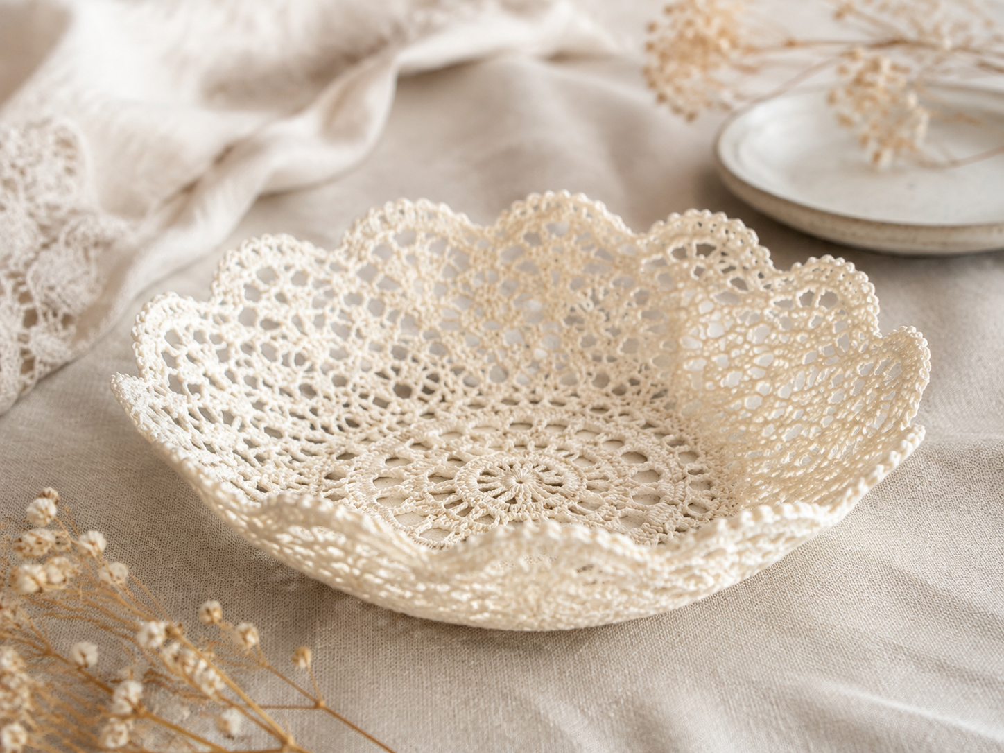 Finished ivory lace doily bowl with scalloped edges